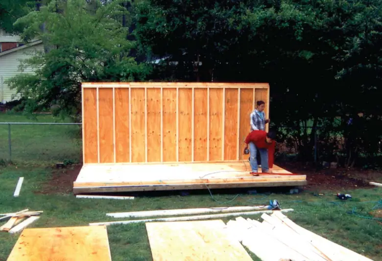 Fairway installers building a storage shed on-site in Charlotte