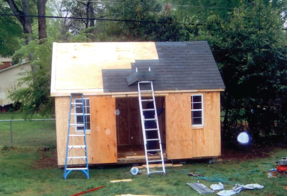 Finished custom wood storage building delivered on-site